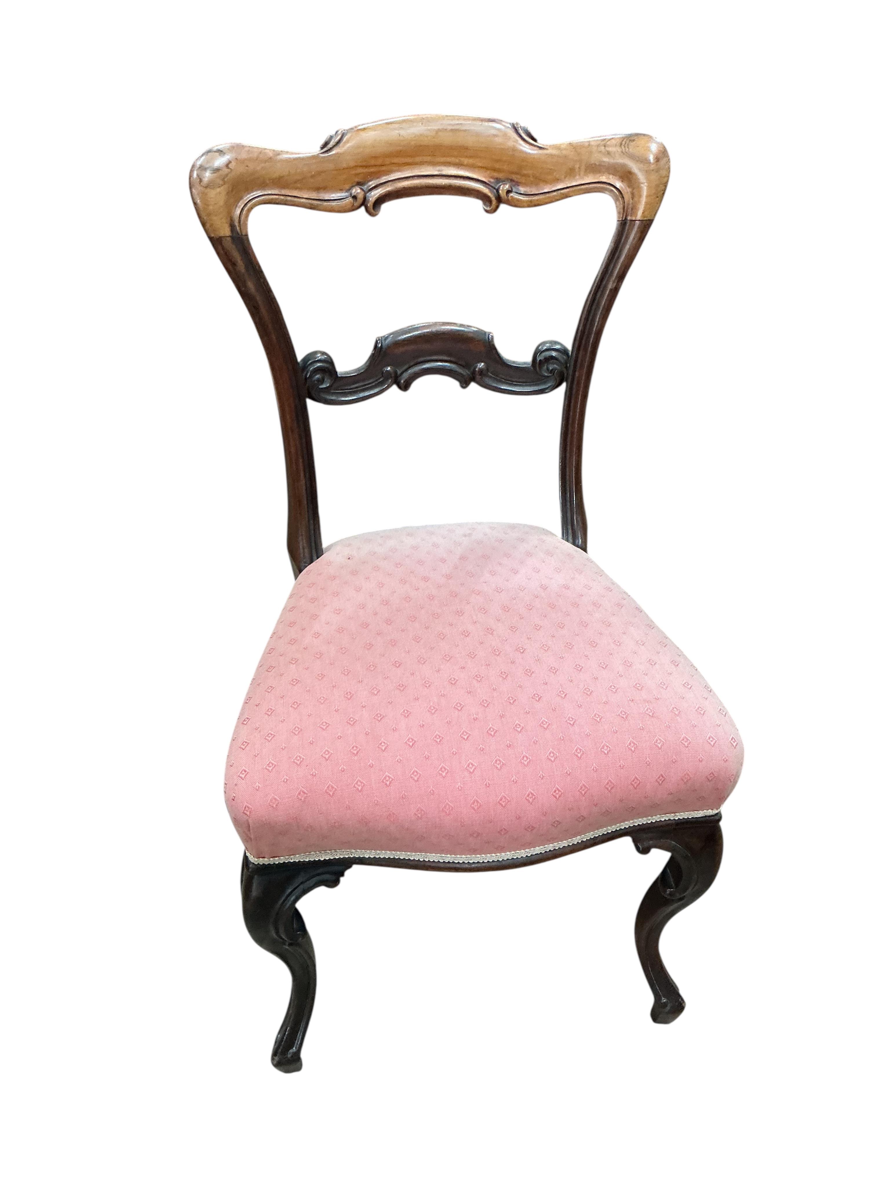 A set of six early Victorian rosewood dining chairs
